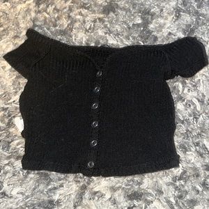 Black over the shoulder cropped top